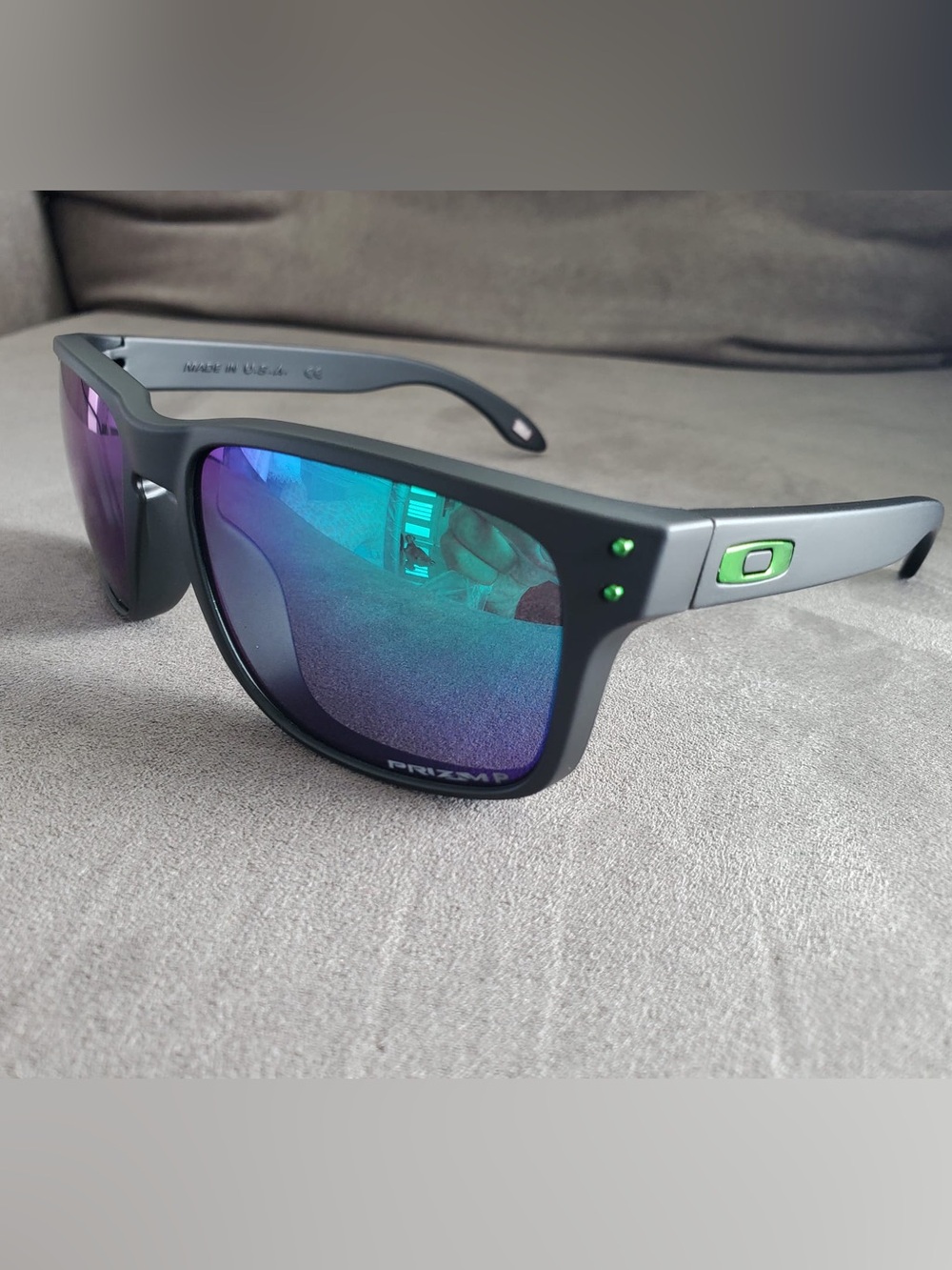 Oakley Matte Gray Frame Sunglasses with Blue-Green Mirrored Lenses